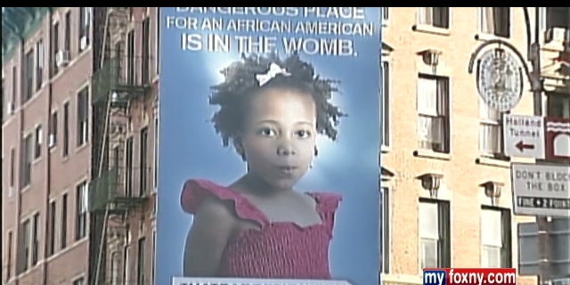 A billboard high above Watts Street and 6th Avenue in lower Manhattan is raising eyebrows over its anti-abortion message which includes an image of a Black girl.