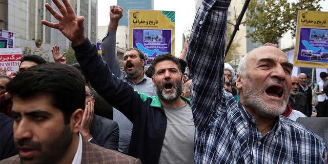 Demonstrators chant slogans during an annual rally marking the anniversary of the 1979 U.S. Embassy takeover in Tehran, Iran, Saturday.