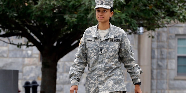 Cadet Simone Askew, of Fairfax, Va., who has been selected first captain of the U.S. Military Academy Corps of Cadets for the upcoming academic year, in West Point, NY, walks to a press conference Monday, Aug. 14, 2017.