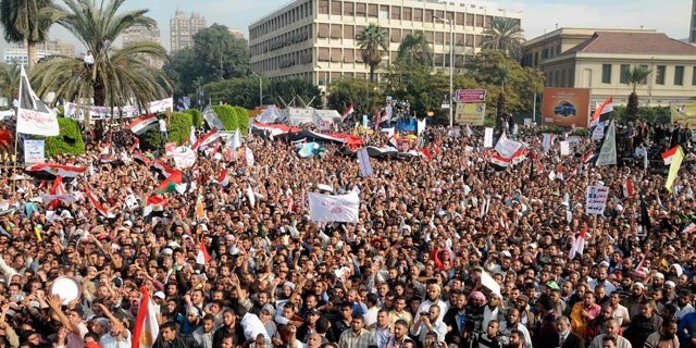 Dec. 1, 2012: Supporters of Egyptian President Mohammed Morsi rally in front of Cairo University, Cairo, Egypt.