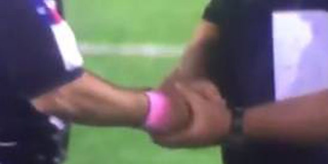Twitter screenshot of post-game handshake involving referee and Calhoun High's Richard Whitaker.