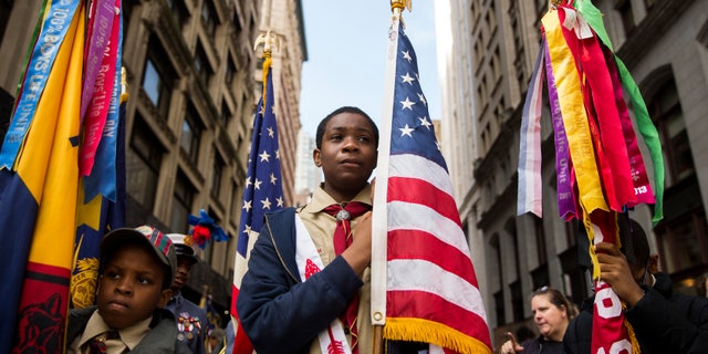 Nov. 11, 2014: Members of the Boy Scouts wait to march in the Veterans Day parade on 5th Avenue in New York.