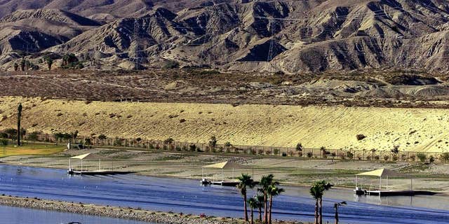 Oct. 17, 2000: A water skier at ShadowLake Estates passes below the San Gorgonio Mountains near Indio, Calif. California lawmakers and an array of interest groups are ramping up effort to designate four new national monuments in the state.