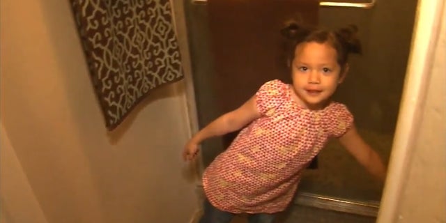 The 4-year-old girl pointing out where she hid.
