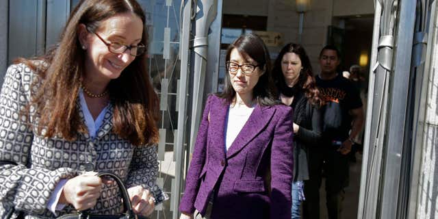 Feb. 24, 2015: Ellen Pao, center, with her attorney, Therese Lawless, left, leaves the Civic Center Courthouse during a lunch break in her trial.