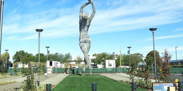 In this photo taken Wednesday Oct. 19, 2016, a 55-foot nude statue stands in San Leandro, Calif.