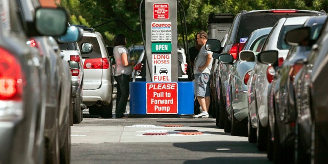 Oct. 5, 2012: Costco members fill up with discounted gasoline at a Costco gas station in Van Nuys, Calif.