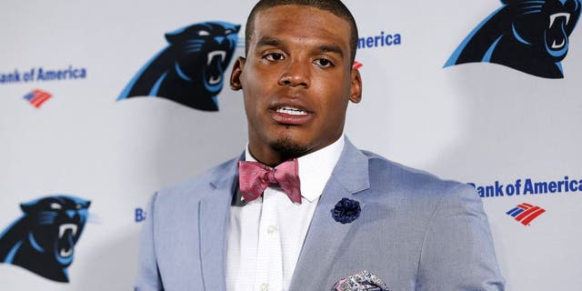 TAMPA, FL - OCTOBER 4: Quarterback Cam Newton #1 of the Carolina Panthers talks with the media after the game against the Tampa Bay Buccaneers at Raymond James Stadium on October 4, 2015 in Tampa, Florida. Panthers defeated the Buccaneers 37 to 23. (Photo by Don Juan Moore/Getty Images)