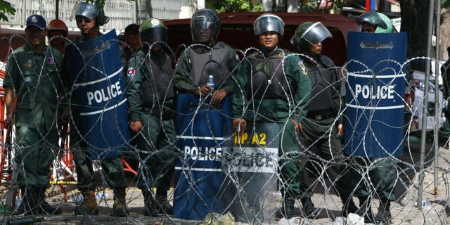 Riot police in Phnom Penh, Cambodia, in 2014.