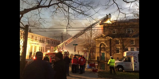 A 10-alarm fire was raging Saturday afternoon in Cambridge, MA.