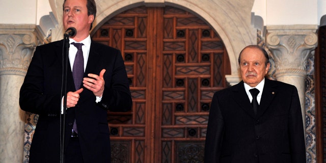 Jan. 30, 2013: Algerian President Abdelaziz Bouteflika, right, listens to Britain's Prime Minister David Cameron as he delivers a speech in Algiers, Wednesday. Britain and Algeria agreed to a security partnership that could see greater intelligence-sharing and planning for future crises, Cameron said Wednesday on a visit to the North African country.