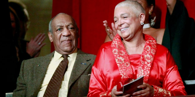Oct. 26, 2009. Bill Cosby, left, and his wife Camille appear at the John F. Kennedy Center for Performing Arts before Bill Cosby received the Mark Twain Prize for American Humor in Washington.