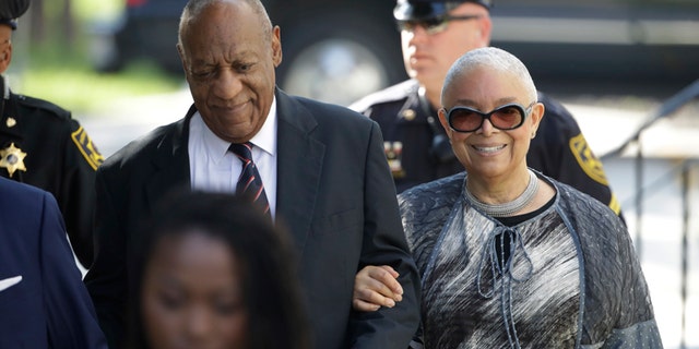 Bill Cosby arrives for his sexual assault trial with his wife Camille Cosby, right, at the Montgomery County Courthouse in Norristown, Pa., Monday, June 12, 2017.