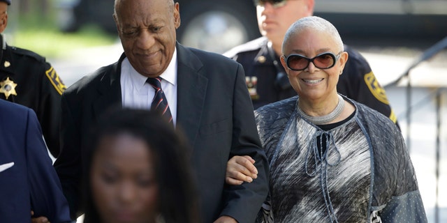 Bill Cosby arrives for his sexual assault trial with his wife Camille Cosby, right, at the Montgomery County Courthouse in Norristown, Pa., Monday, June 12, 2017.