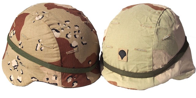 Two very different camouflage pattern helmet covers that were used by the U.S. Military in Iraq.