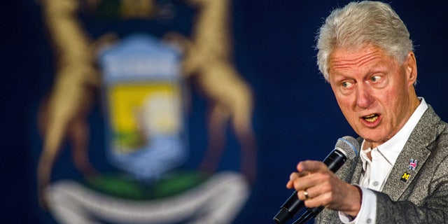 Former President Bill Clinton speaks, Monday, Oct. 3, 2016 at Northbank Center in downtown Flint, Mich. Clinton is campaigning for his wife, 2016 Democratic presidential nominee Hillary Clinton, in Michigan. (Jake May/The Flint Journal via AP)
