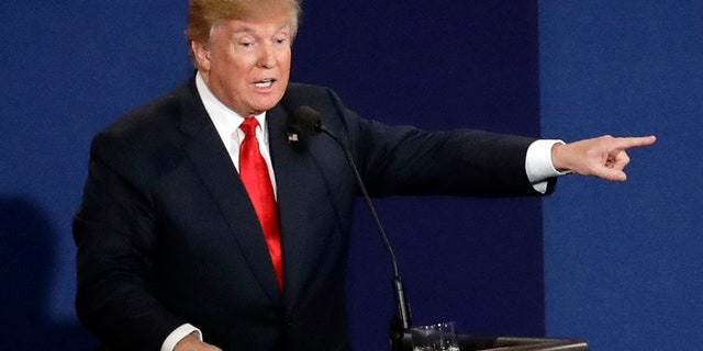 Republican presidential nominee Donald Trump debates Democratic presidential nominee Hillary Clinton during the third presidential debate at UNLV in Las Vegas, Wednesday, Oct. 19, 2016.
