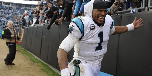 Students in Greeley, Colo., are free to don Cam Newton's No. 1 jersey, but not Peyton Manning's No. 18.