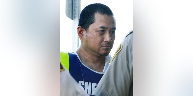 File- This Aug. 5, 2008, file photo shows Vince Li. Li, who was found not criminally responsible for beheading and cannibalizing a fellow passenger on a Greyhound bus has been granted his freedom. Manitoba's Criminal Code Review Board announced Friday, Feb. 10, 2017, it has given Will Baker, formerly known as Vince Li, an absolute discharge, meaning he is longer subject to monitoring. (John Woods/The Canadian Press via AP, File)