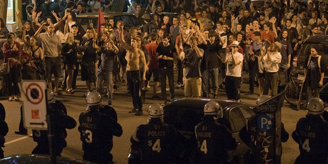 May 24, 2012: Protesters and riot police face-off during a march against tuition fee hikes in Montreal.