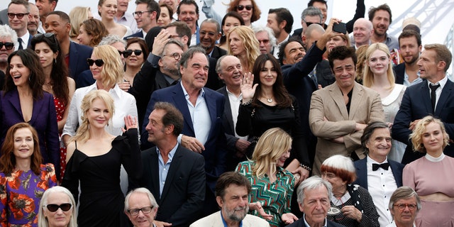 Actors and directors form former Cannes selections pose for photographers during the photo call for the 70th Anniversary of the international film festival, Cannes, southern France, Tuesday, May 23, 2017.