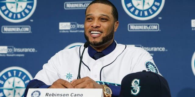 Dec. 12, 2013: Robinson Cano talks to reporters after he was introduced as the newest member of the Seattle Mariners baseball team in Seattle. (AP/Ted S. Warren)