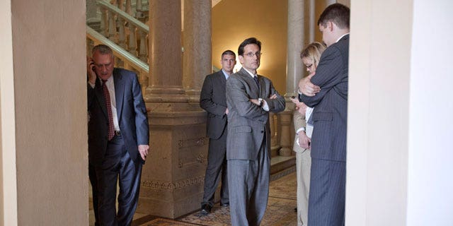 House Majority Leader Eric Cantor of Va., center, Senate Minority Leader Jon Kyl of Ariz., left, and others, are seen on Capitol Hill in Washington, Thursday, June 9, 2011, following a meeting on the debt ceiling. (AP)