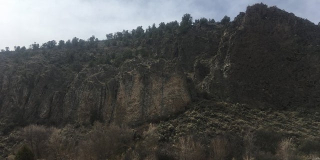 A man died after falling from a cliff in Garfield Canyon, Utah on Saturday.