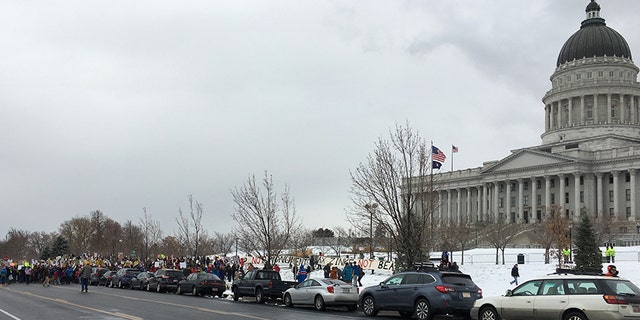 Protesters line up outside of Utah's capitol. President Trump signed a pair of executive orders to significantly shrink two of Utah’s national monuments.
