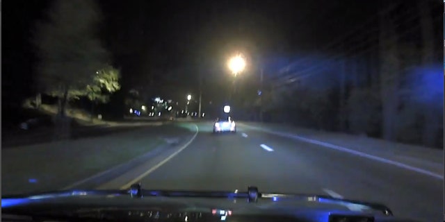 The driver was stopped after a police officer struck the Mercedes in the rear.