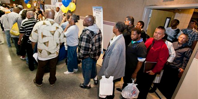 Job seekers line up at the 10th annual Skid Row Career Fair held at the Los Angeles Mission in downtown Los Angeles June 2.