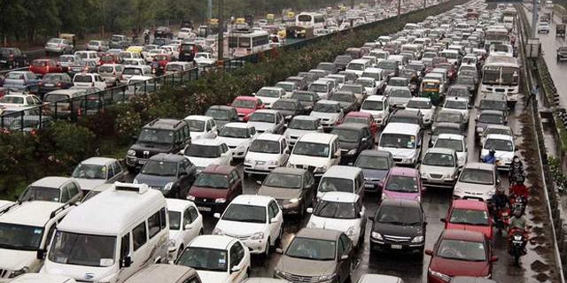 Traffic jam on the Delhi-Gurgaon road near New Delhi, India.
