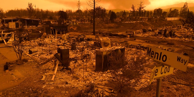 Homes leveled by the Carr Fire line the Lake Keswick Estates area of Redding, Calif., on Friday, July 27, 2018.