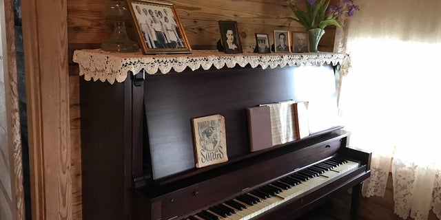 The Cash family piano is one of many original items on display at the Johnny Cash Boyhood Home in Dyess, Ark. The Cash family moved to Dyess in 1935 during the Great Depression.
