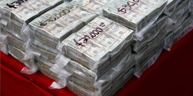 FILE: Packages of money seized during a drug sting.
