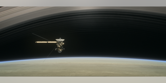 This artist's illustration shows Cassini making one of its final five dives through Saturn's upper atmosphere in August and September 2017.