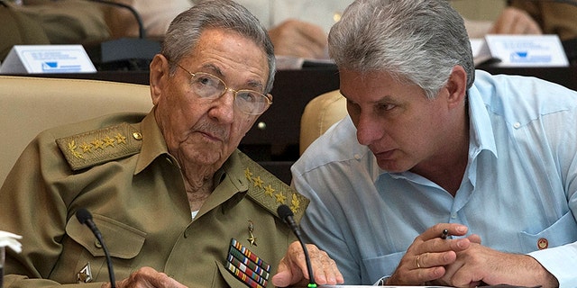 Cuba's President Raul Castro (L) chats with Cuba's Vice President Miguel Diaz-Canel react during the National Assembly in Havana, Cuba, July 8, 2016. Ismael Francisco/Courtesy of Cubadebate/Handout via Reuters.