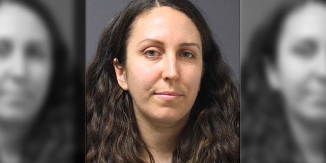 Catherine Gregory, who turned herself in on Sunday to face charges of attempted larceny and disorderly conduct for taking notes from the lectern while Lucian Wintrich was speaking on the UConn campus on Nov. 28.