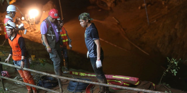 A U.S. military team and British cave experts joined the rescue effort for 12 boys and their soccer coach missing for five days inside the cave being flooded by near-constant rains.