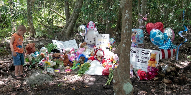 July5: Mark Likins, of Thomasville, Ga., visits the memorial of Caylee Anthony before Casey Anthony was found not guilty of first-degree murder, aggravated manslaughter and aggravated child abuse in Orlando, Fla.