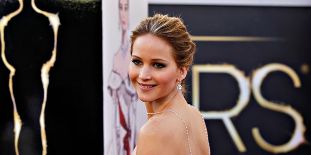 Jennifer Lawrence arrives at the 85th annual Academy Awards.
