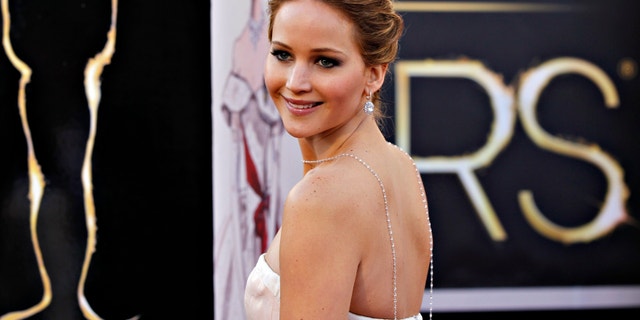 Jennifer Lawrence arrives at the 85th annual Academy Awards.