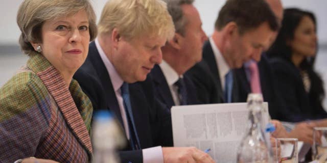 Britain's Prime Minister Theresa May holds a regional Cabinet meeting in Runcorn, England, Monday Jan. 23, 2017 as she launched her industrial strategy for post-Brexit Britain with a promise the Government will "step up" and take an active role in backing business (Stefan Rousseau//PA via AP)