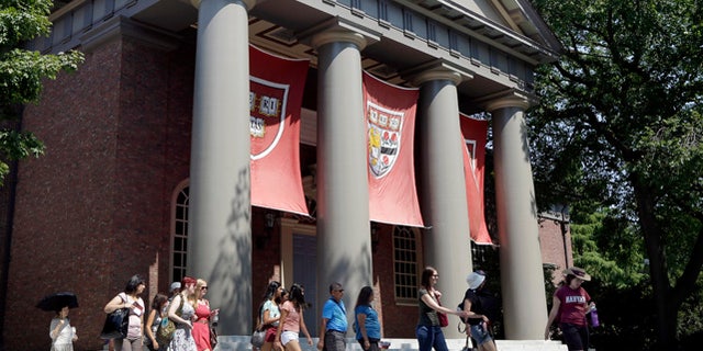 Aug. 30, 2012: People are led on a tour group at the campus of Harvard University in Cambridge, Mass. (AP)