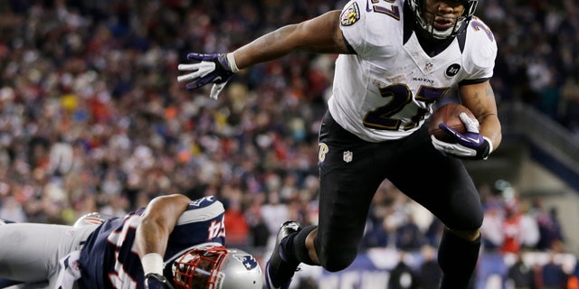 Jan. 20, 2013: Baltimore Ravens running back Ray Rice goes in for a two-yard touchdown run against New England Patriots outside linebacker Donta Hightower (54) during the first half of the NFL football AFC Championship football game in Foxborough, Mass. (AP)
