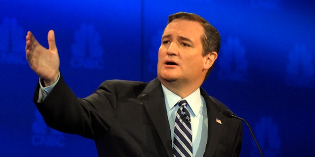 In this Oct. 28, 2015, photo, Republican presidential candidate Sen. Ted Cruz, r-Texas, talks about the mainstream media during the CNBC Republican presidential debate at the University of Colorado in Boulder, Colo. Cruz says the U.S. adopt a European-style value added tax, adding to a division in the Republican presidential field. Some simply want to cut existing tax rates. But Cruz is among those who suggests scrapping the nations tax code entirely and starting from scratch. (AP Photo/Mark J. Terrill)