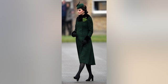 The Duchess stayed warm with tights and gloves.