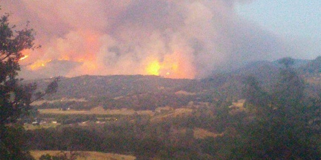 The 2015 fire shrouded the remote Northern California community in smoke, and left a trail of destruction.