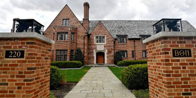 The former Penn State Beta Theta Pi currently sits empty on Burrowes Road after being shut down. A Penn State fraternity pledge died after stumbling and falling several times with toxic levels of alcohol in his body and suffered for hours with severe injuries while his friends failed to summon help, authorities said Friday, May 5, 2017, in announcing criminal charges against the fraternity and 18 of its members.(Abby Drey/Centre Daily Times via AP)