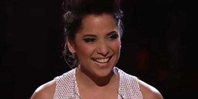June 21, 2011: Vicci Martínez smiles as her coach music producer and singer Cee Lo Green congratulates her on a good performance on NBC's 'The Voice.'